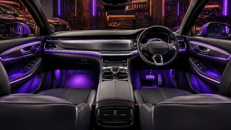Illustrative concept of purple ambient lighting across a car dashboard, doors and footwells